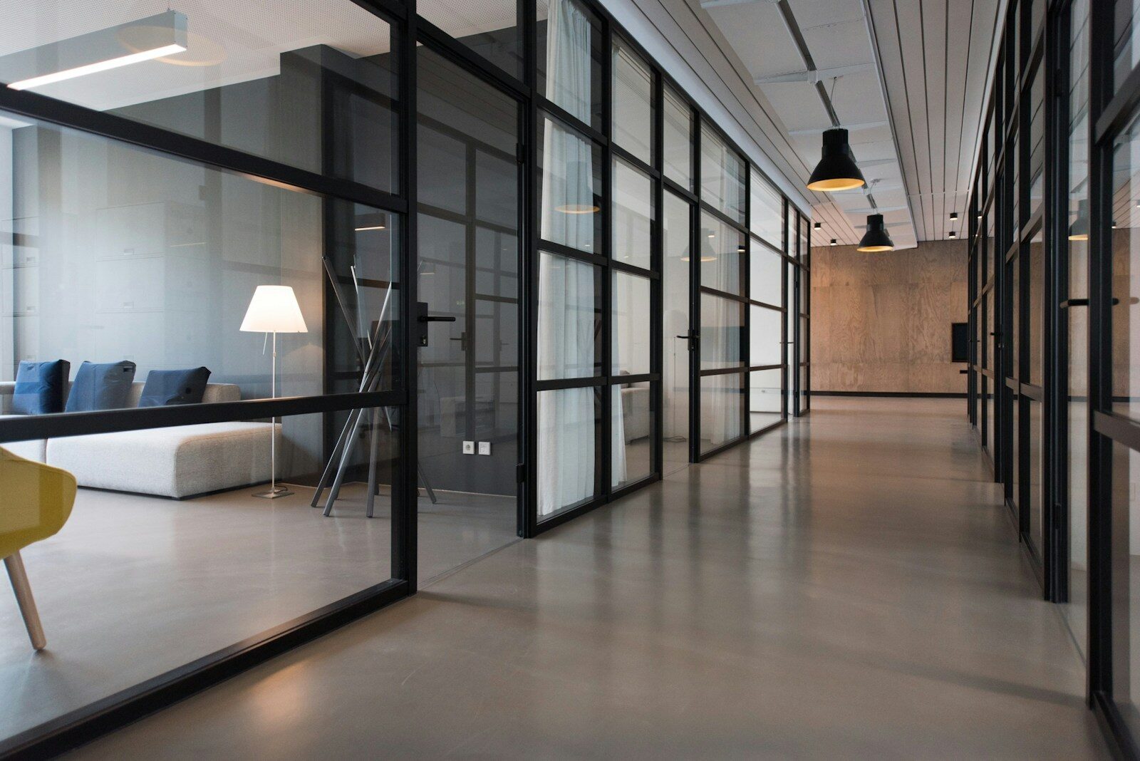 Office cleaning quote request form: hallway between glass-panel doors
